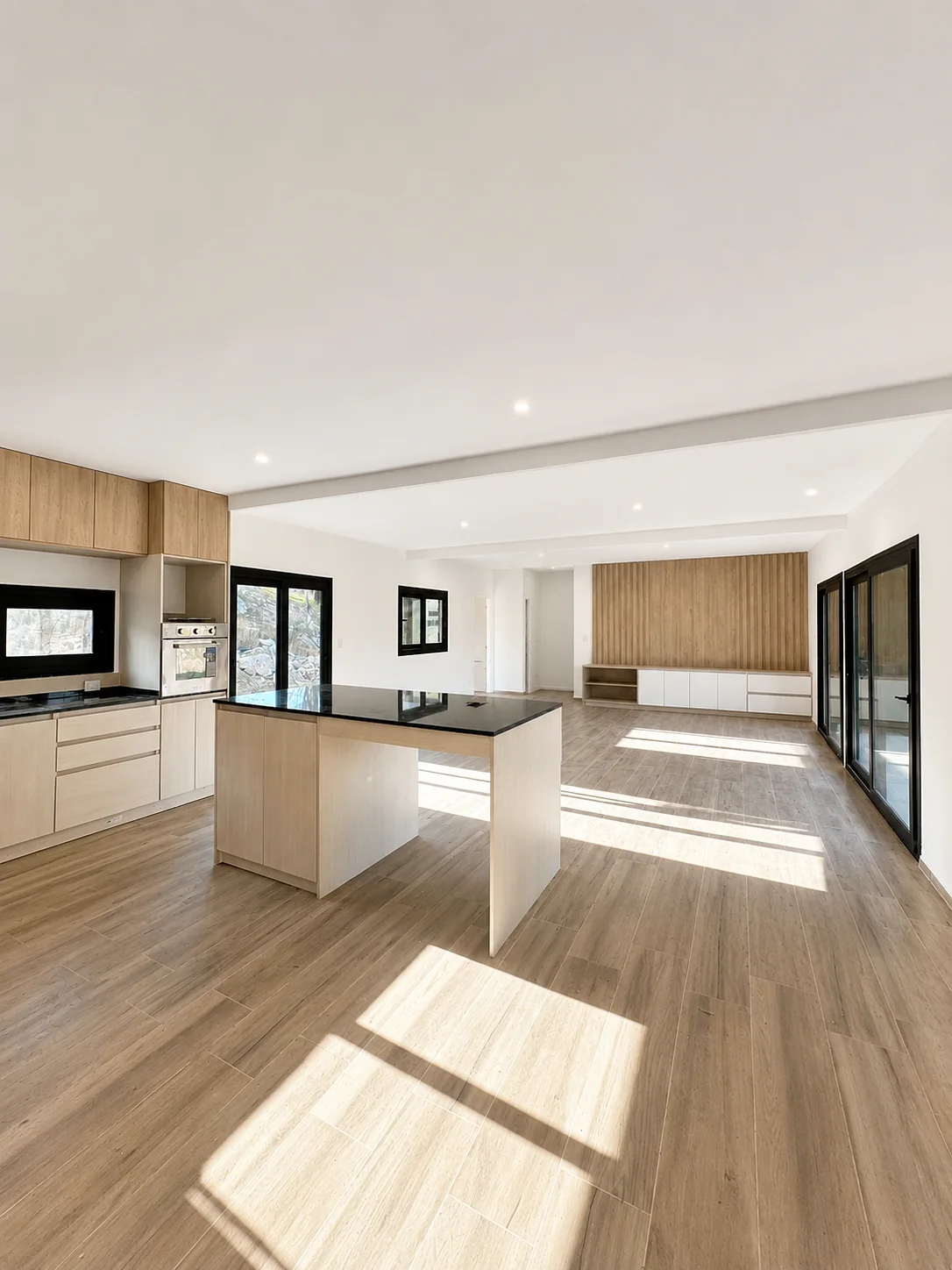Altos de Carlos Paz — Cocina con isla integrada al living