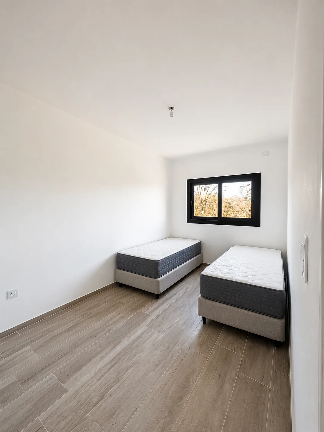 Altos de Carlos Paz — Dormitorio con dos camas de una plaza