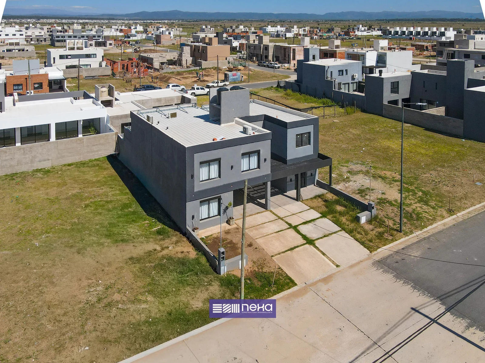 Rincones de Manantiales — Vista aérea del dúplex en el barrio